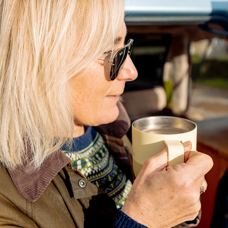 12oz-rise-mug-j1 12oz_rise_coffee_mug_wax_yellow_woman_drink_closeup_square.jpg