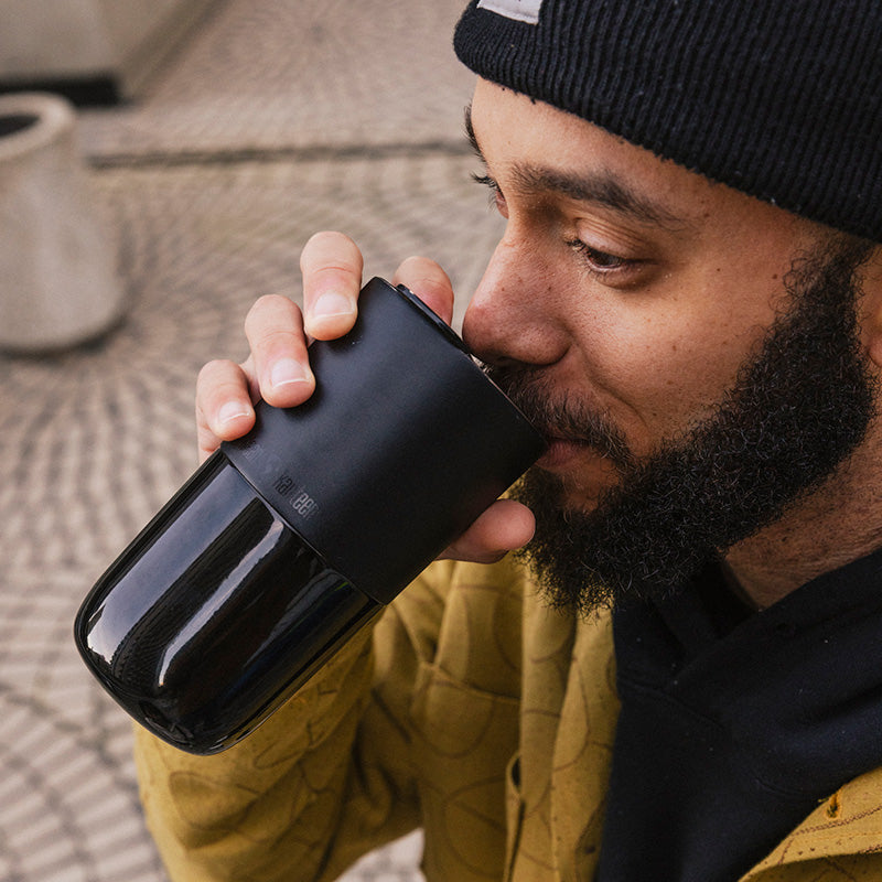 16oz-rise-tumbler-s8 16oz_rise_tumbler_black_man_drink_square.jpg
