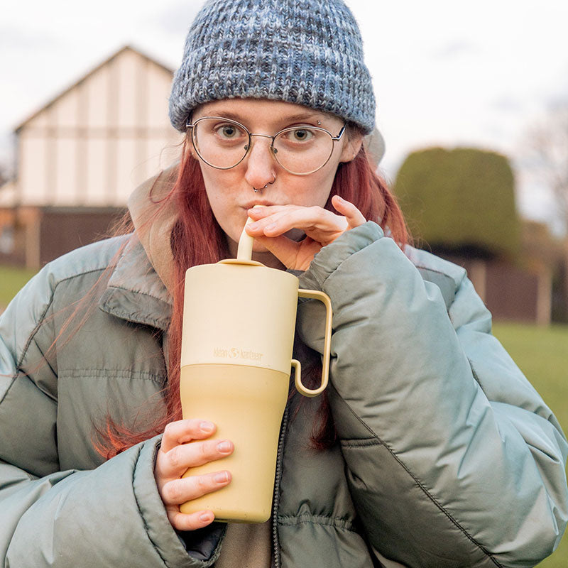 26oz-rise-tumbler-with-straw-lid-w1 26oz_rise_rumbler_straw_wax_yellow_woman_sip_square.jpg