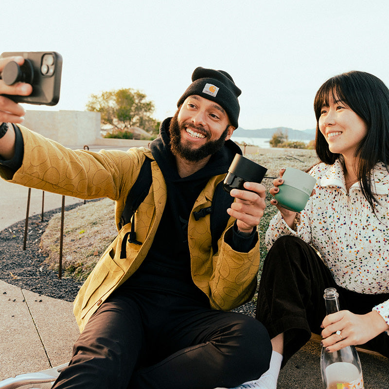 bring-your-own-party-kit-tumblers-and-cocktails-p6 8oz_rise_lowball_black_iceberg_couple_selfie_city_square.jpg
