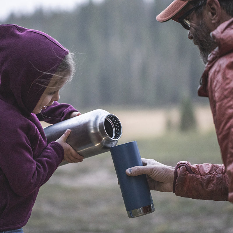 64oz-tkwide-with-loop-cap-r3 tkwide_64oz_bottle_girl_dad_filling_square.jpg